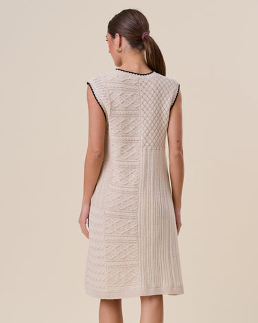 Whip stitched textured mini sweater dress