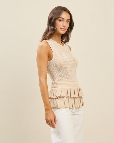 Ruffled peplum knit top
