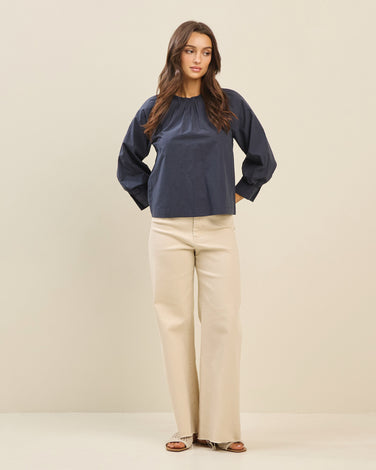Bow open back blouse