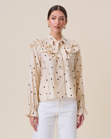 Polka dot ruffled blouse