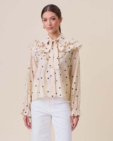 Polka dot ruffled blouse