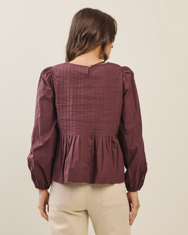 Volume sleeve swing top