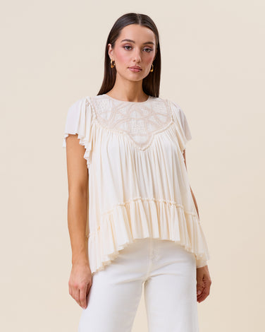 Embroidered ruffle blouse