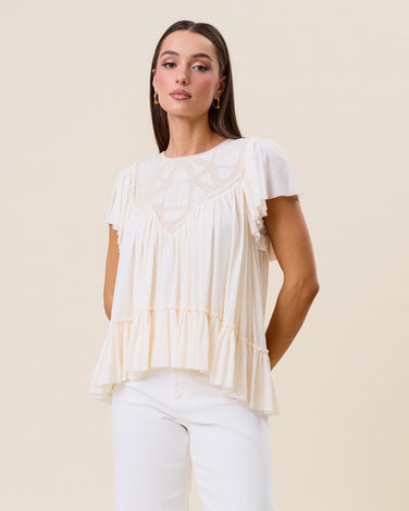 Embroidered ruffle blouse