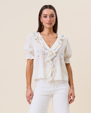 Embroidered ruffle blouse