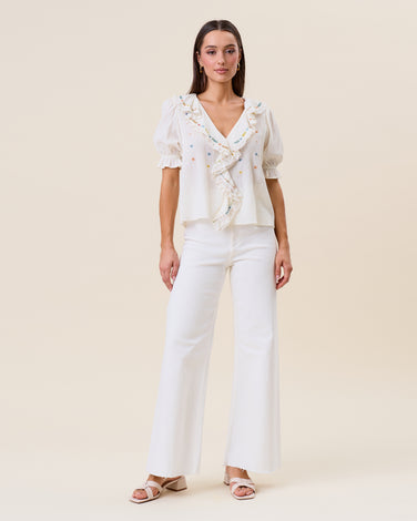 Embroidered ruffle blouse