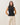 Semi-sheer sleeveless mockneck sweater