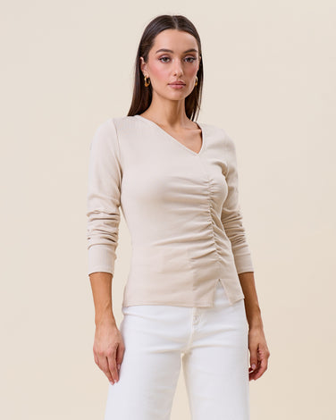 Asymmetric shirred top