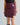 Vegan suede brooch draped mini skirt
