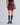 Vegan suede brooch draped mini skirt