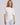 ASYMMETRIC BOAT NECK KNIT TOP