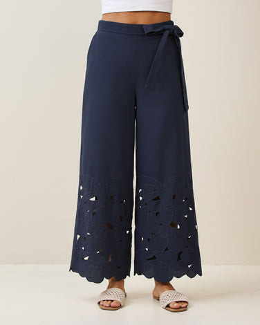 Floral embroidered cutout pants with waist tie